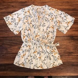 New! Faux wrap styled shirt. Cute and comfortable!